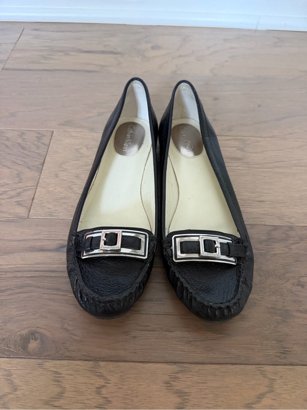 Calvin Klein Black Leather Moccasin Flats with Silver Buckle Accent